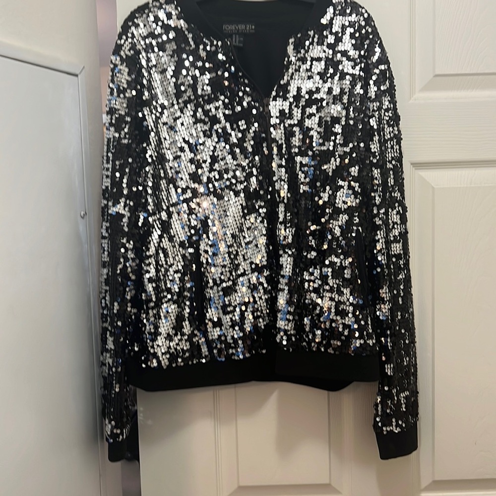 Zip front bomber style jacket
